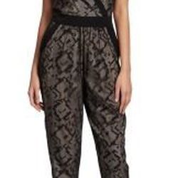 Kenneth Cole <a href="http://www.kennethcole.com/product/index.jsp?productId=23875876">Lace-Front Jumpsuit</a>, $228.