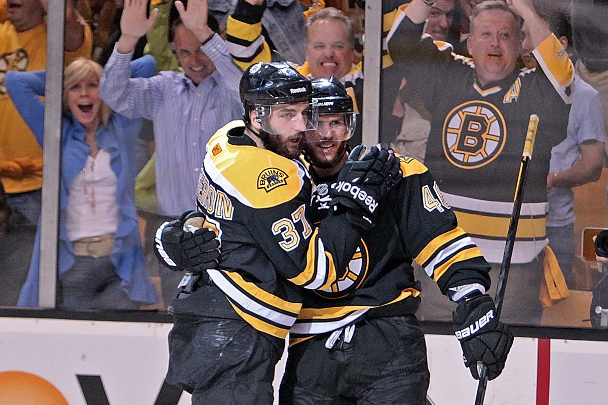 (061311 Boston, MA) Boston Bruins center Patrice Bergeron celebrates center David Krejci’s goal in the third period of Game Six of the NHL Stanley Cup Finals at the TD Garden Monday, June 13, 2011. Staff Photo by Matt Stone