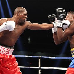 Jermain Taylor returned to stop Juan Carlos Candelo in the seventh round.