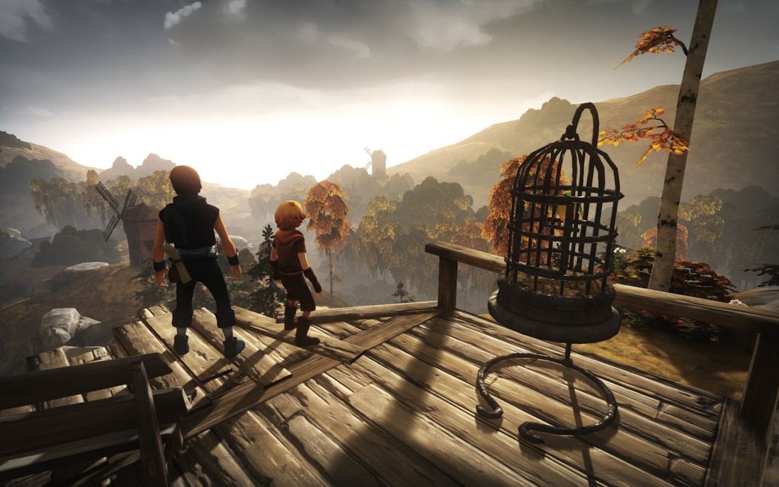 The two heroes of Brothers: A Tale of Two Sons look out over a woodsy landscape
