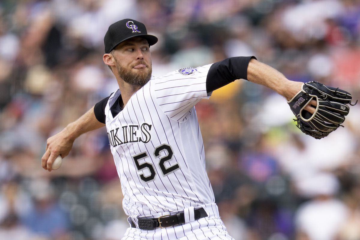 Daniel Bard of the Colorado Rockies delivers a pitch during the eighth inning of a game against the New York Mets at Coors Field on May 28, 2023 in Denver, Colorado.