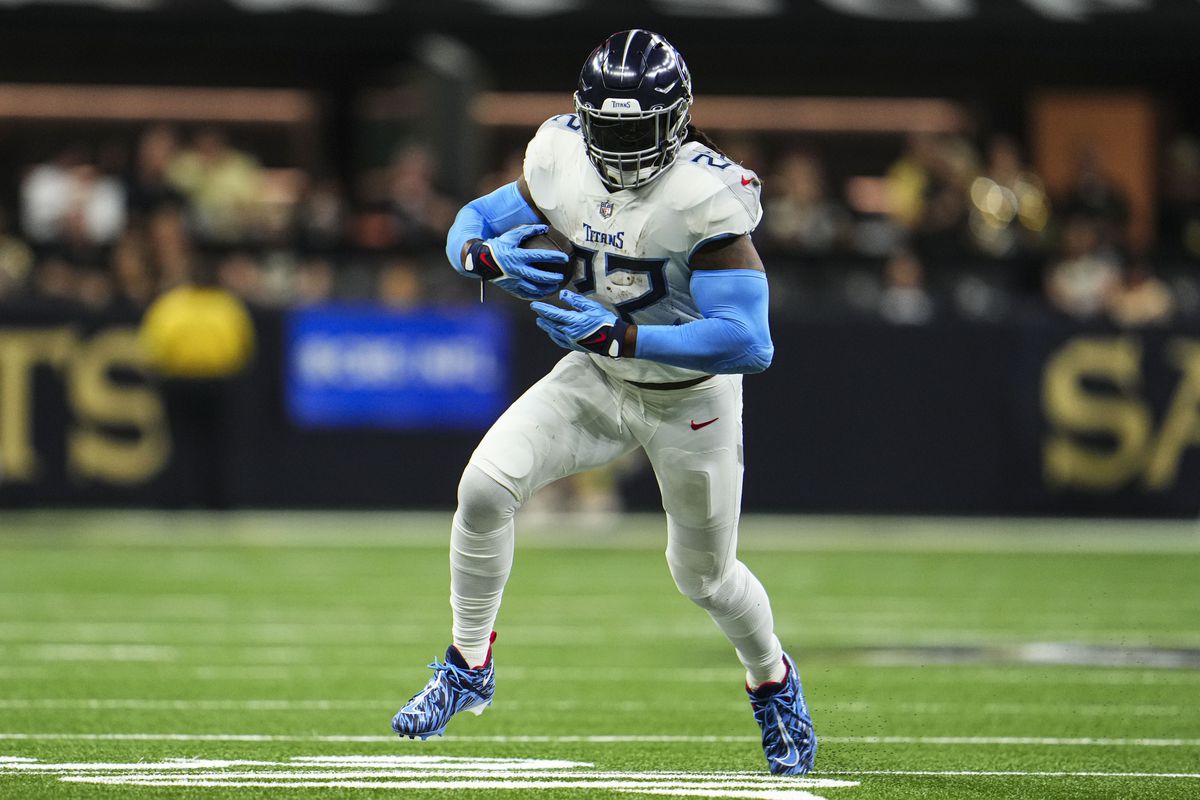 Derrick Henry #22 of the Tennessee Titans runs the ball at Caesars Superdome on September 10, 2023 in New Orleans, Louisiana.