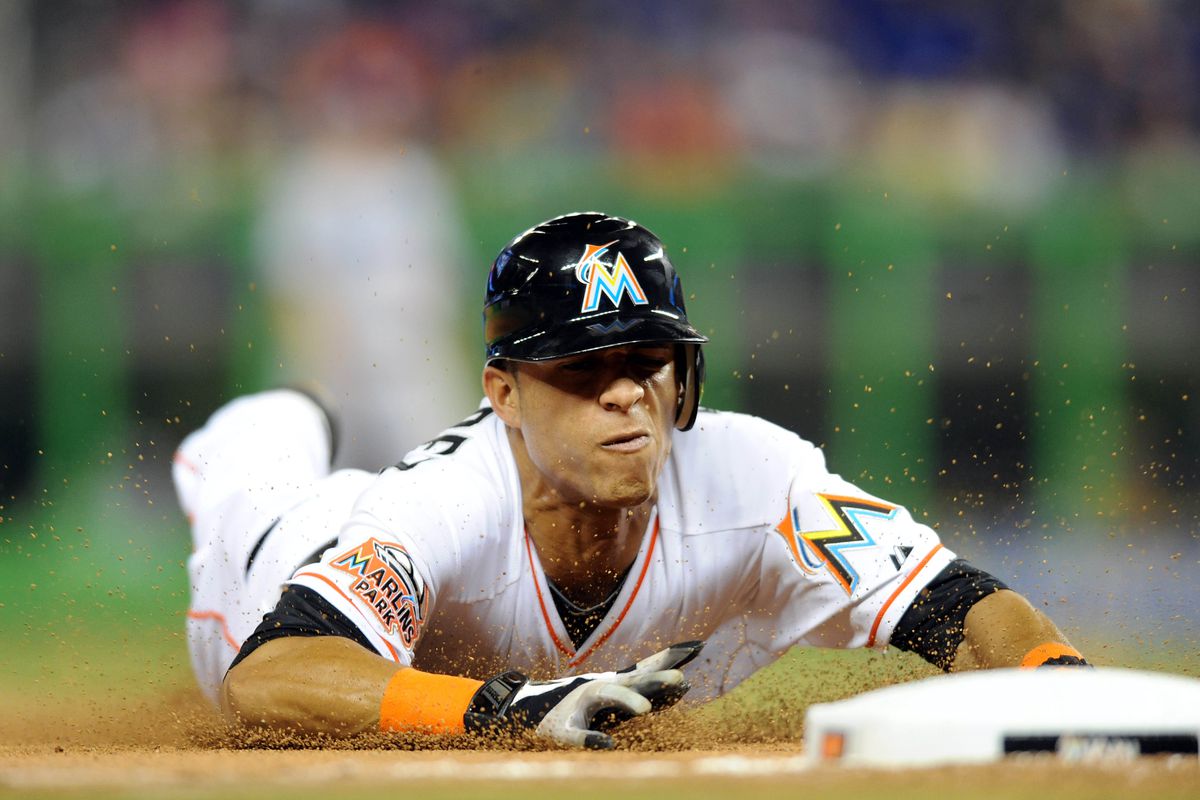 Aug 11, 2012; Miami, FL, USA; Miami Marlins center fielder Gorkys Hernandez (2) steals third base during the eighth inning against the against the Los Angeles Dodgers at Marlins Park. The Marlins won 7-3. Mandatory Credit: Steve Mitchell-US PRESSWIRE