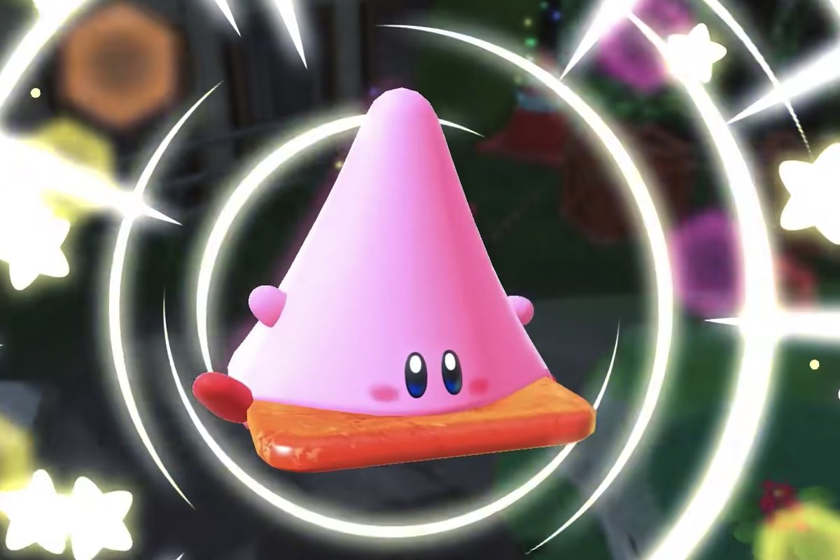 Kirby assumes the shape of a traffic cone in a screenshot from Kirby and the Forgotten Land