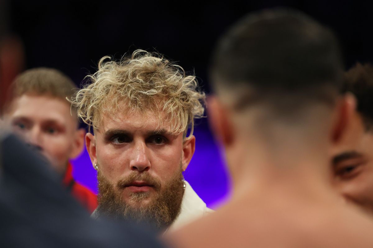 Jake Paul stares at Tommy Fury.