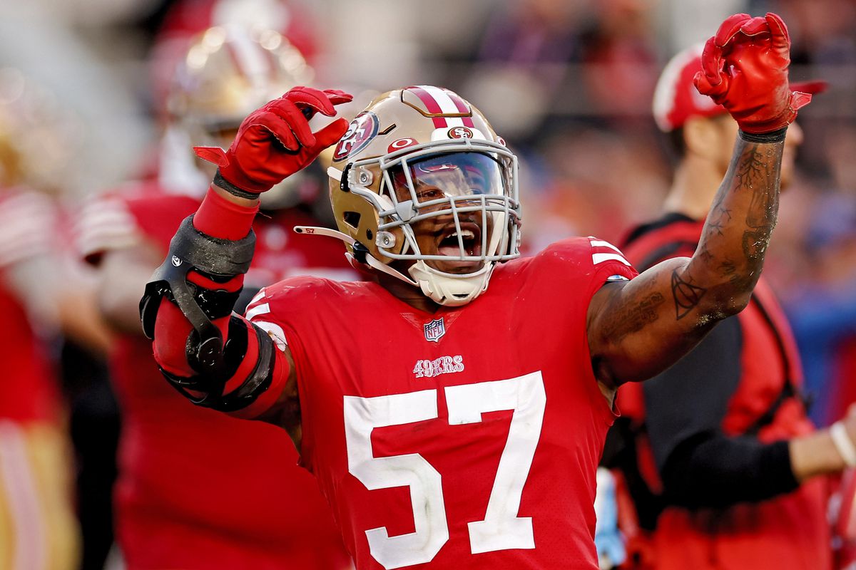 Dre Greenlaw #57 of the San Francisco 49ers celebrates after returning a fumble for a touchdown during the fourth quarter against the Miami Dolphins at Levi’s Stadium on December 04, 2022 in Santa Clara, California.