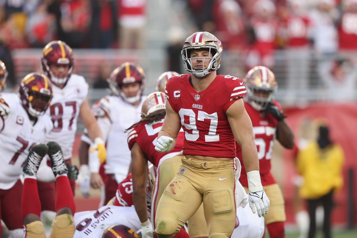 Nick Bosa #97 of the San Francisco 49ers reacts after causing a turnover in the fourth quarter against the Washington Commanders at Levi’s Stadium on December 24, 2022 in Santa Clara, California.