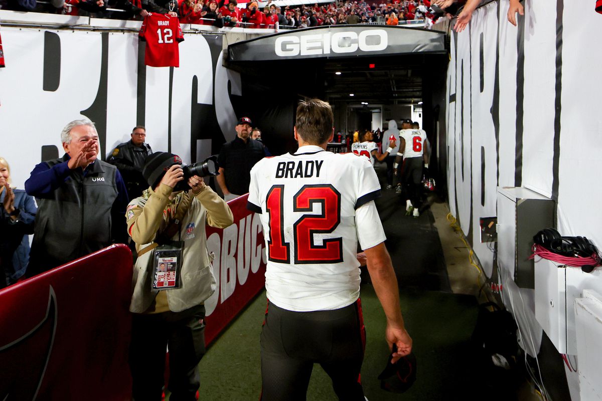 Tom Brady of the Tampa Bay Buccaneers walks off the field after losing to the Dallas Cowboys 31-14 in the NFC Wild Card playoff game at Raymond James Stadium on January 16, 2023 in Tampa, Florida.