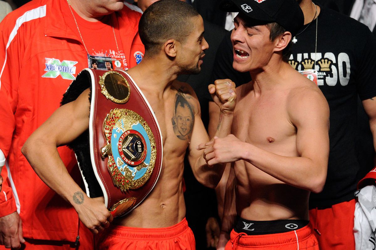 Wilfredo Vazquez Jr. and Jorge Arce jaw at yesterday's weigh-in. (Photo by Ethan Miller/Getty Images)