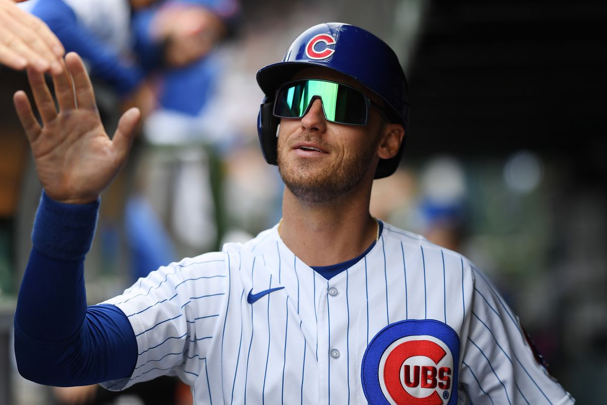 Cody Bellinger of the Chicago Cubs celebrates in the dugout with teammates after scoring against the Miami Marlins at Wrigley Field on May 05, 2023 in Chicago, Illinois.