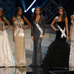 The top five Miss USA finalists pose onstage during the Miss USA 2013 pageant, Sunday, June 16, 2013, in Las Vegas. (AP Photo/Jeff Bottari)