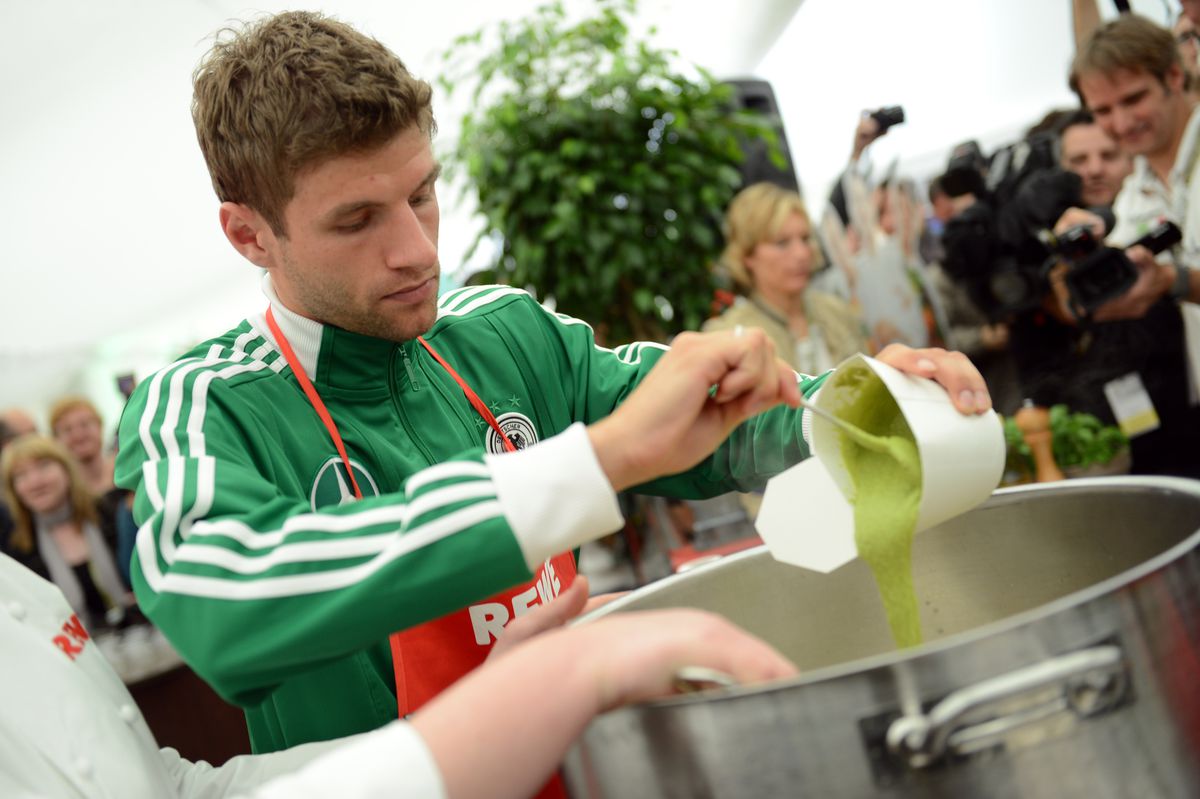 German forward Thomas Mueller cooks a ri