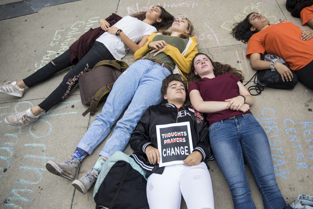 High school students from the Chicago area stage a die-in demonstration in front of Trump Tower, to protest gun violence on the anniversary of the Pulse nightclub shooting. | Ashlee Rezin/Sun-Times