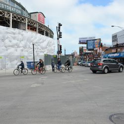 Bike tour group passing in front of the ballpark -