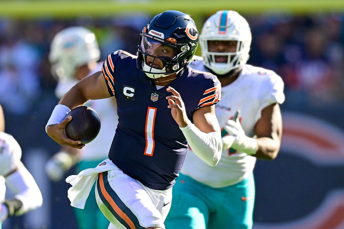 Justin Fields #1 of the Chicago Bears runs the ball during the second half in the game against the Miami Dolphins at Soldier Field on November 06, 2022 in Chicago, Illinois.