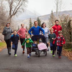 Sasha and Sarah Pachev believe running as a family (with their nine children, ages 4 1/2 months to 16) brings individual and familial benefits.