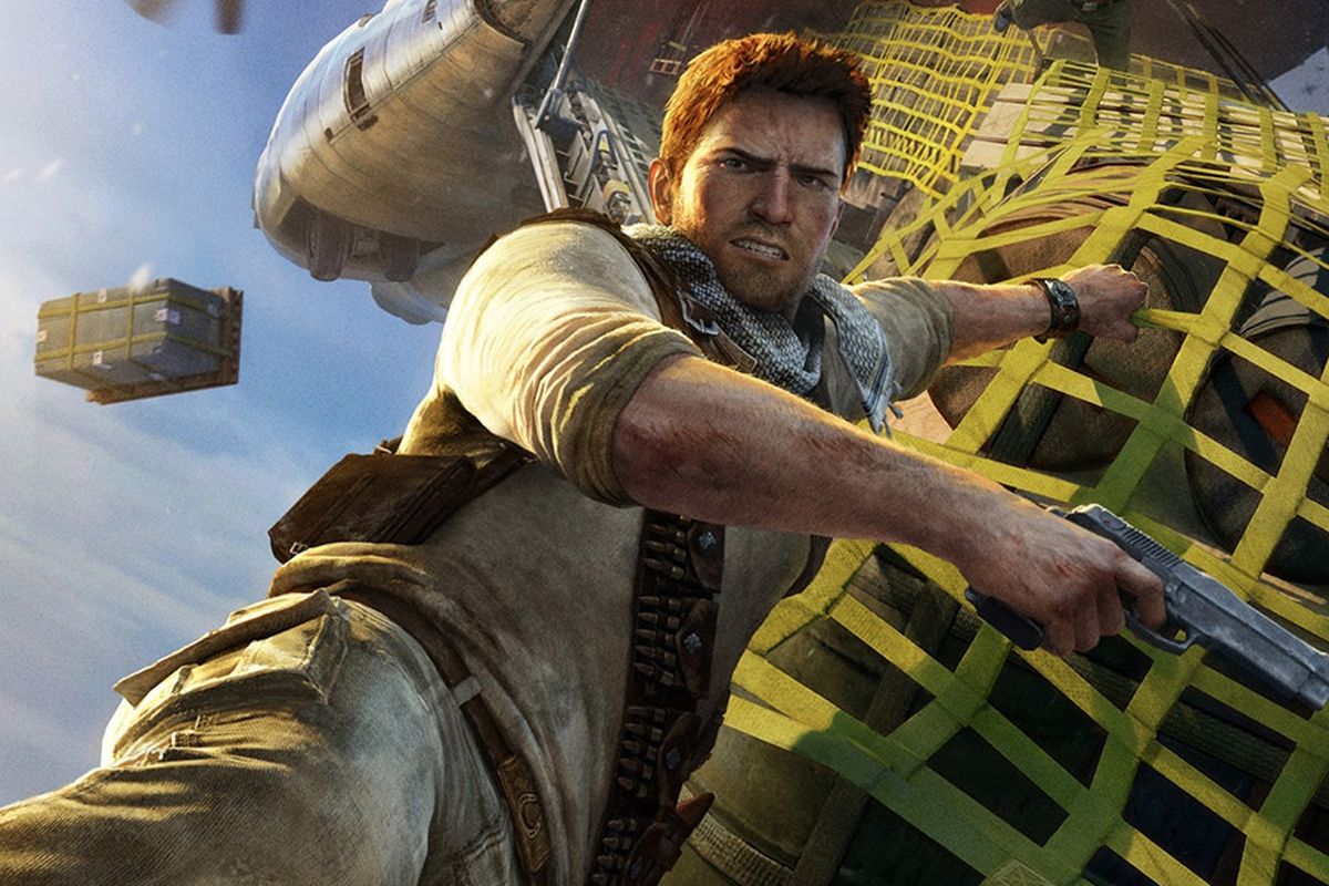 Nathan Drake hangs on to a plane cargo strap for his dear life in a promo shot from Uncharted