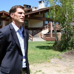 Josh Romney talks about the private retreat hosted by his father, Mitt Romney, outside of the Stein Eriksen Lodge at Deer Valley in Park City on Thursday, June 6, 2013.