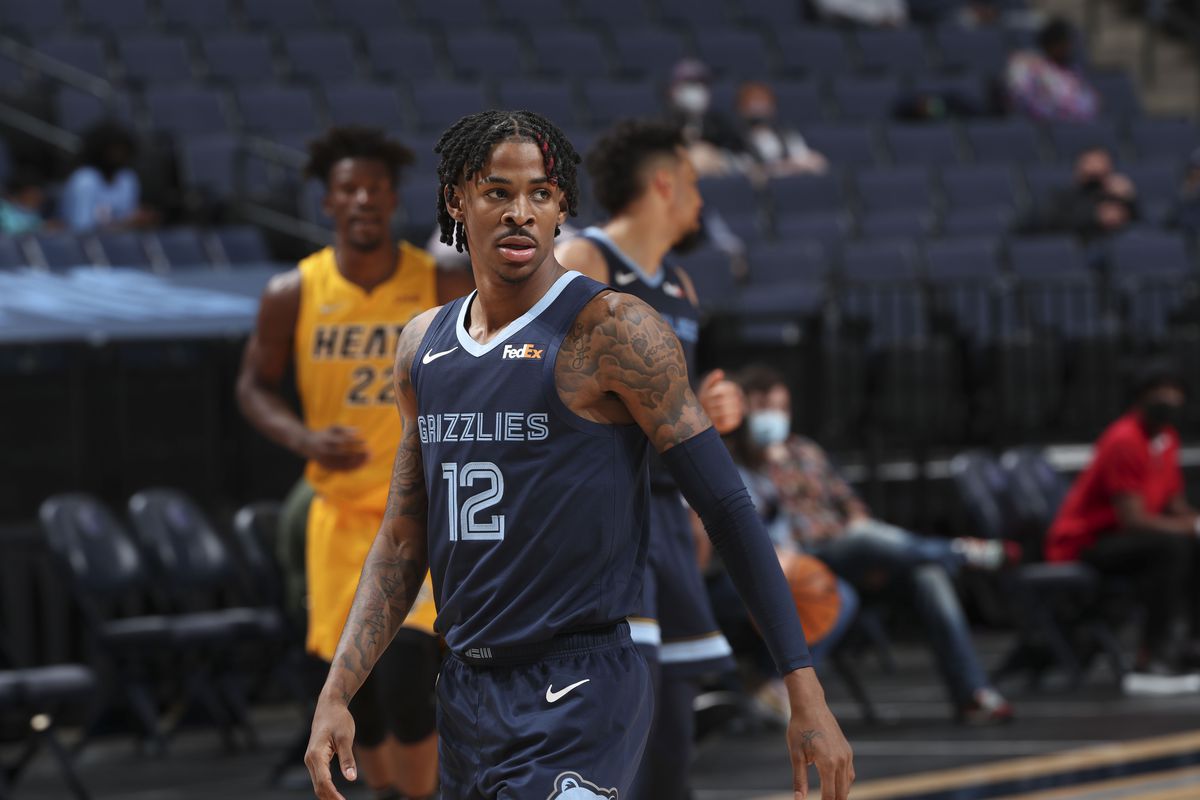 Ja Morant #12 of the Memphis Grizzlies looks on during the game against the Miami Heat on March 17, 2021 at FedExForum in Memphis, Tennessee.