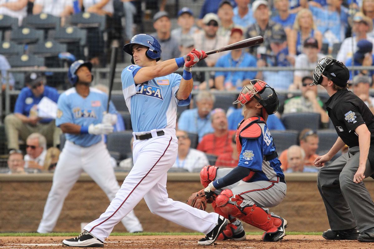 July 9, 2012; Kansas City, MO, USA; USA team third baseman Mike Olt (20) at bat in the second inning of the 2012 All Star Futures Game at Kauffman Stadium. Mandatory Credit: Denny Medley-US PRESSWIRE