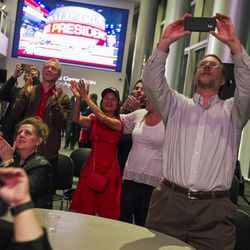 Donald Trump supporters cheer after he was proclaimed the president-elect during at the Utah GOP's election night party in Salt Lake City on Tuesday, Nov. 8, 2016.
