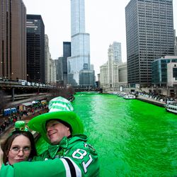 Stacey Peterson and Kevin McGuire take a selfie with the green Chicago River to celebrate St. Patrick’s Day, Saturday, March 17th, 2018. | James Foster/For the Sun-Times