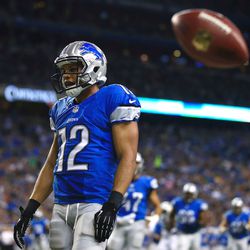 Aug 9, 2013; Detroit, MI, USA; Detroit Lions wide receiver Matt Willis (12) celebrates after catching a pass in the end zone for a touchdown in the second quarter of a preseason game against the New York Jets at Ford Field.