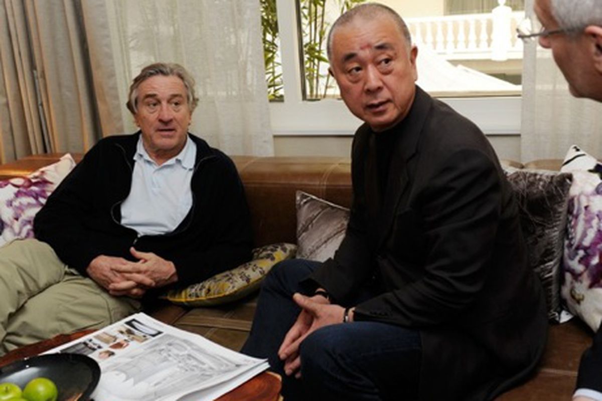 Robert De Niro and Nobu Matsuhisa discuss room design with Gary Selesner inside Nobu Hotel space at Caesars Palace.  