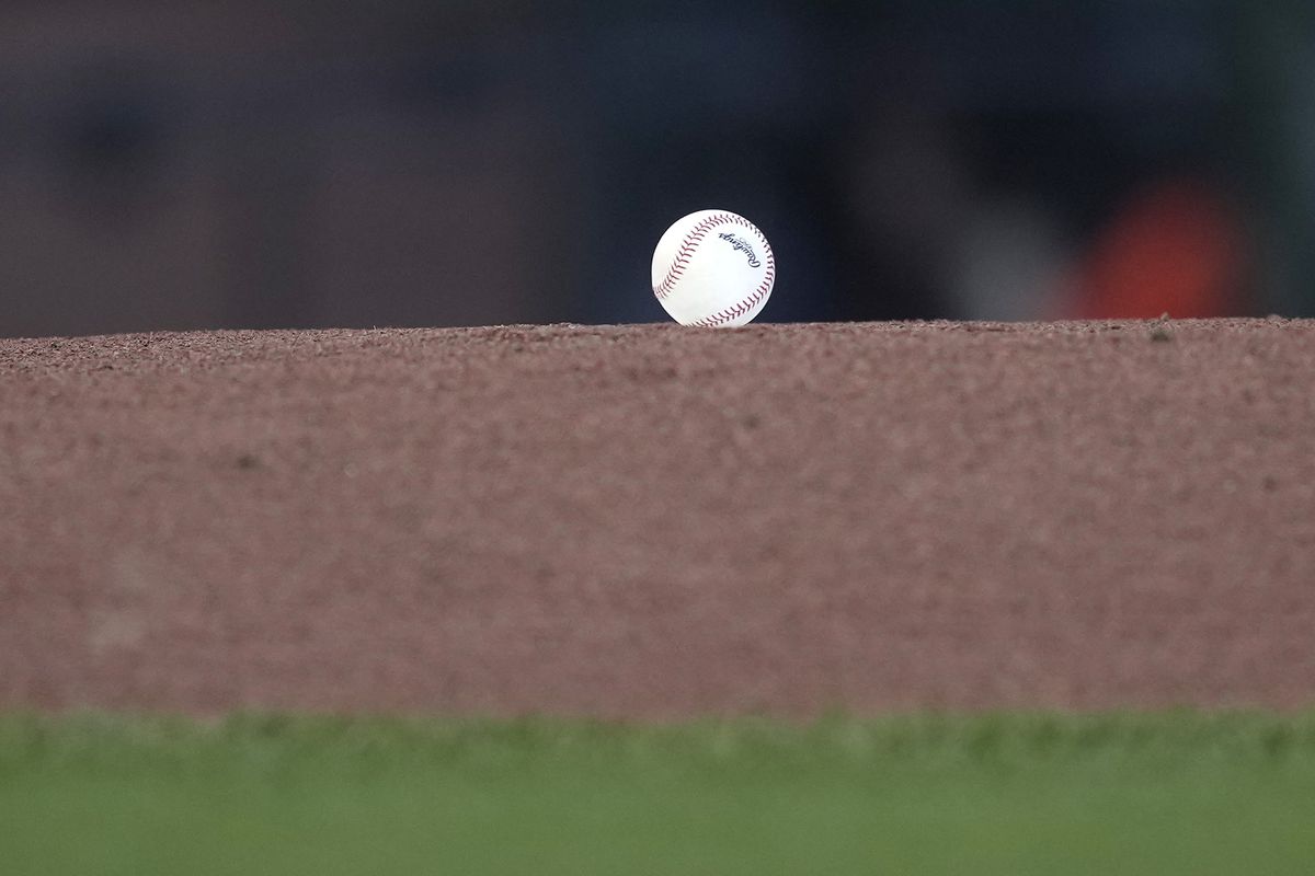 A ball on top of a pitching mound