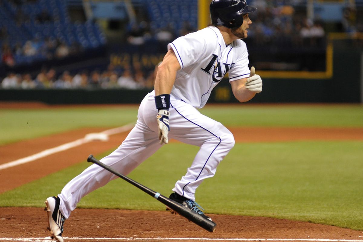 Luke Scott hustles out of the box to pick up a double.  (Photo by Al Messerschmidt/Getty Images)