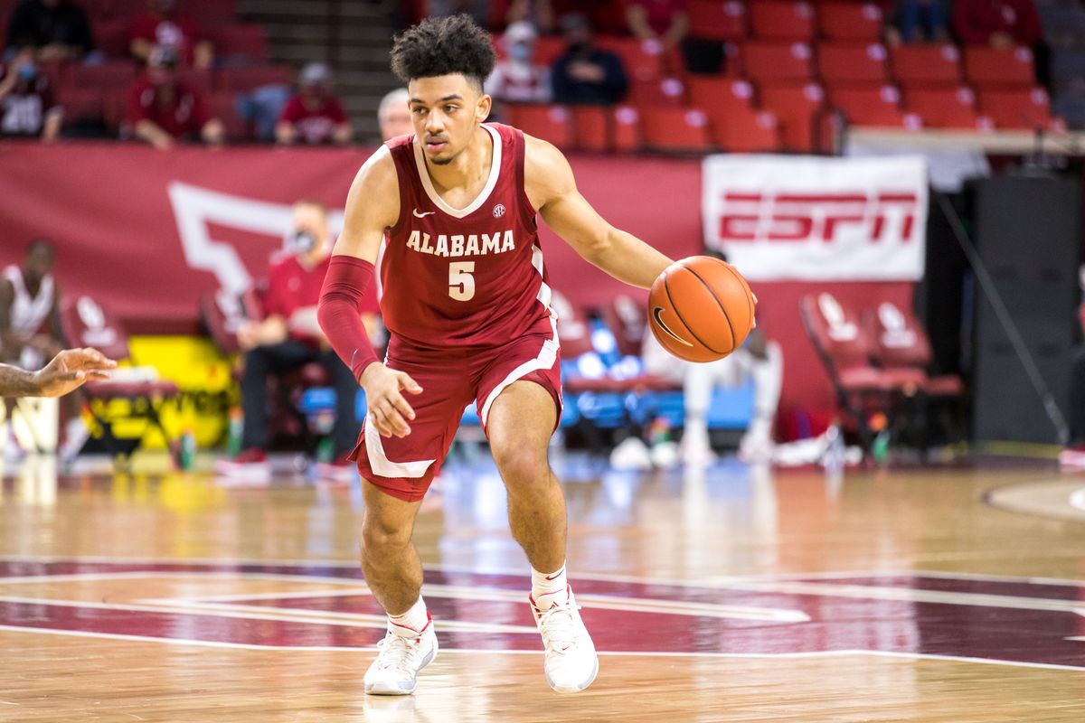 Alabama Crimson Tide guard Jaden Shackelford brings the ball up court during the second half against the Oklahoma Sooners on January 30, 2021 at Lloyd Noble Center in Norman Oklahoma.