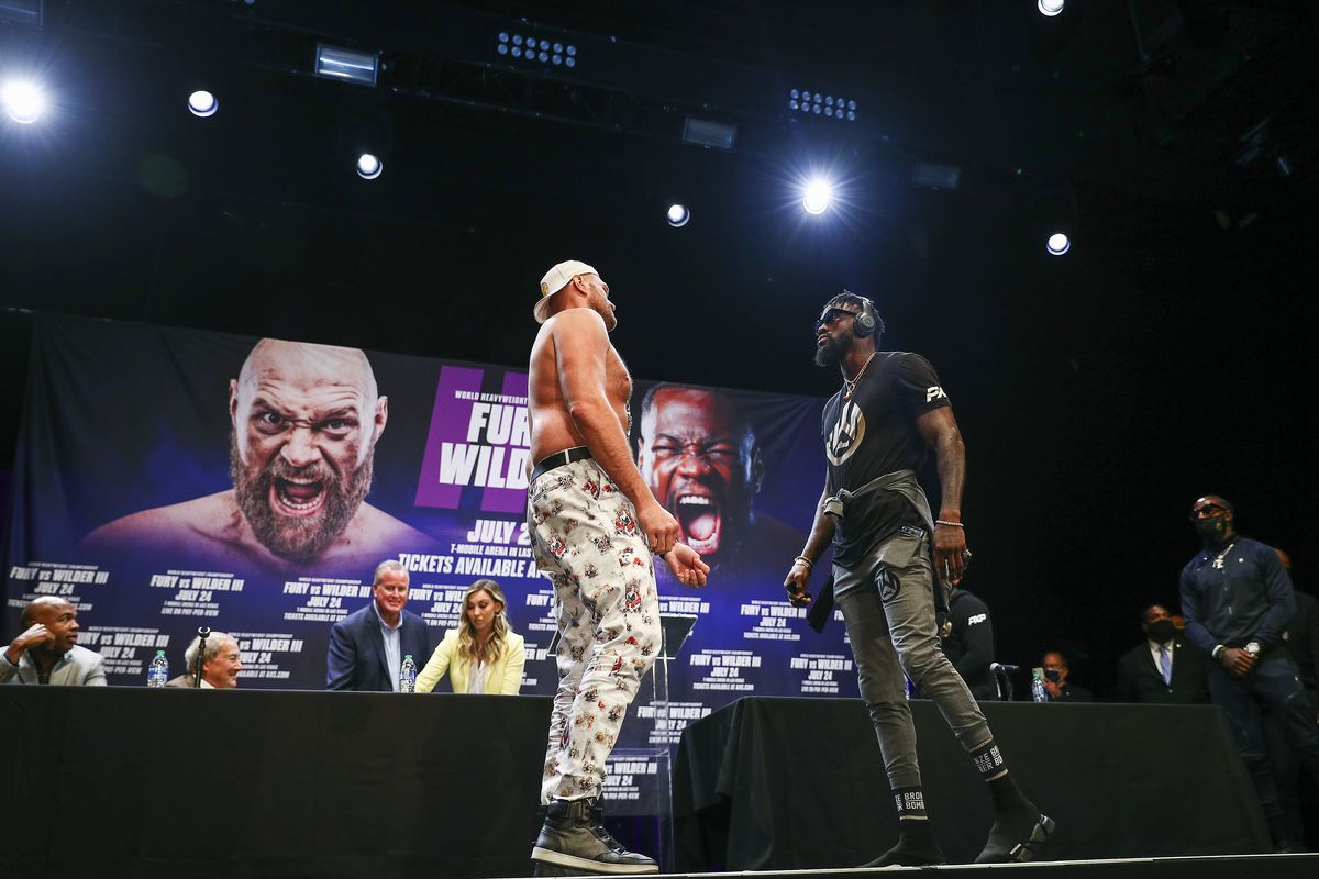 Tyson Fury and Deontay Wilder face off during the press conference at The Novo by Microsoft at L.A. Live on June 15, 2021 in Los Angeles, California.