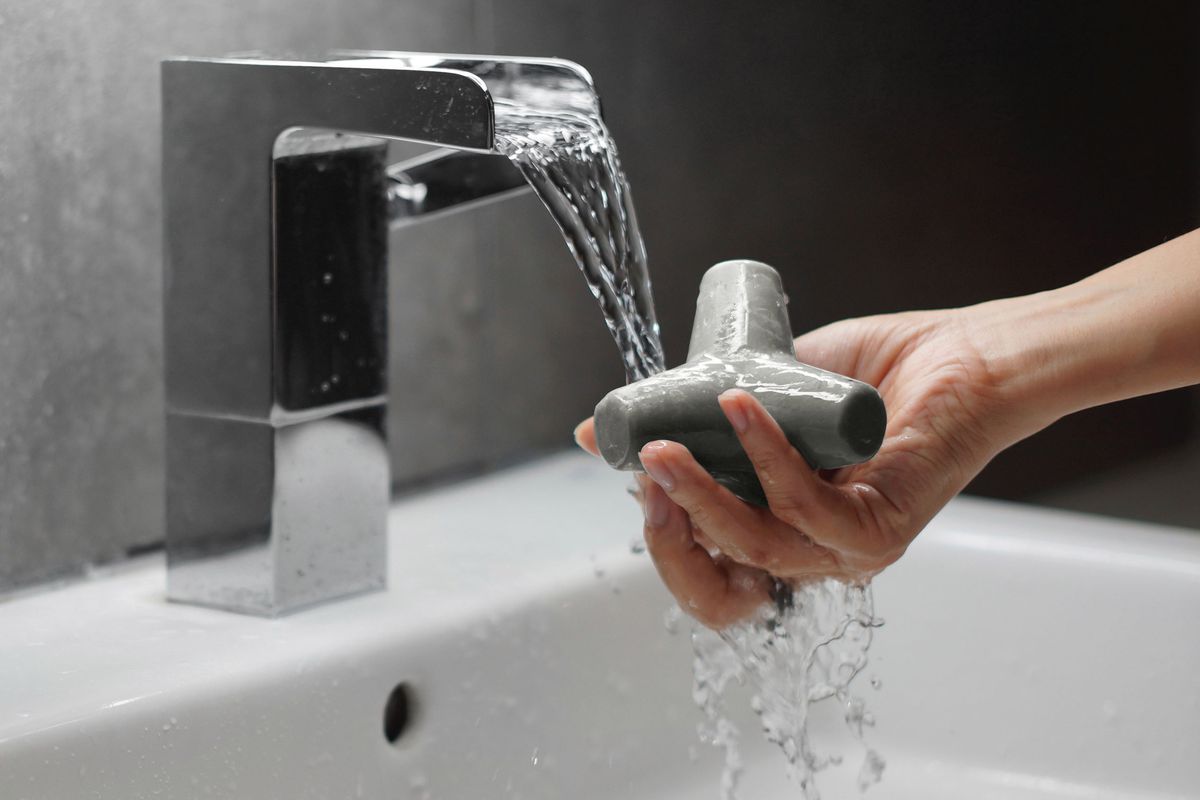 Hand washing with concrete-looking soap
