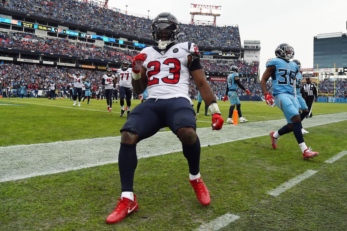 Houston Texans running back Carlos Hyde runs for a touchdown during the second half against the Tennessee Titans at Nissan Stadium.