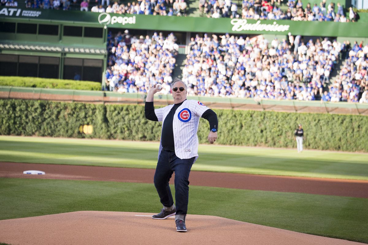 Tony Mantuano throws the first pitch at Wrigley Field.