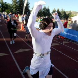 Joseph Balden, dressed as Princess Leia, approaches the finish line of the Wasatch Back with his team Wasatch Wars, the Ragnar Strikes Back, at Park City High School in Park City on Saturday, June 22, 2013.