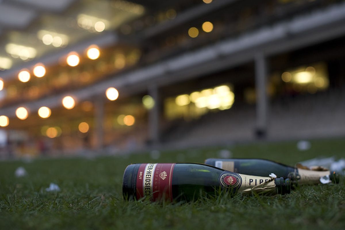 CHELTENHAM, ENGLAND - MARCH 15: Two spent bottles of champagne at the end of the first days racing at Cheltenham racecourse on March 15, 2011 in Cheltenham, England  (Photo by Alan Crowhurst/ Getty Images)