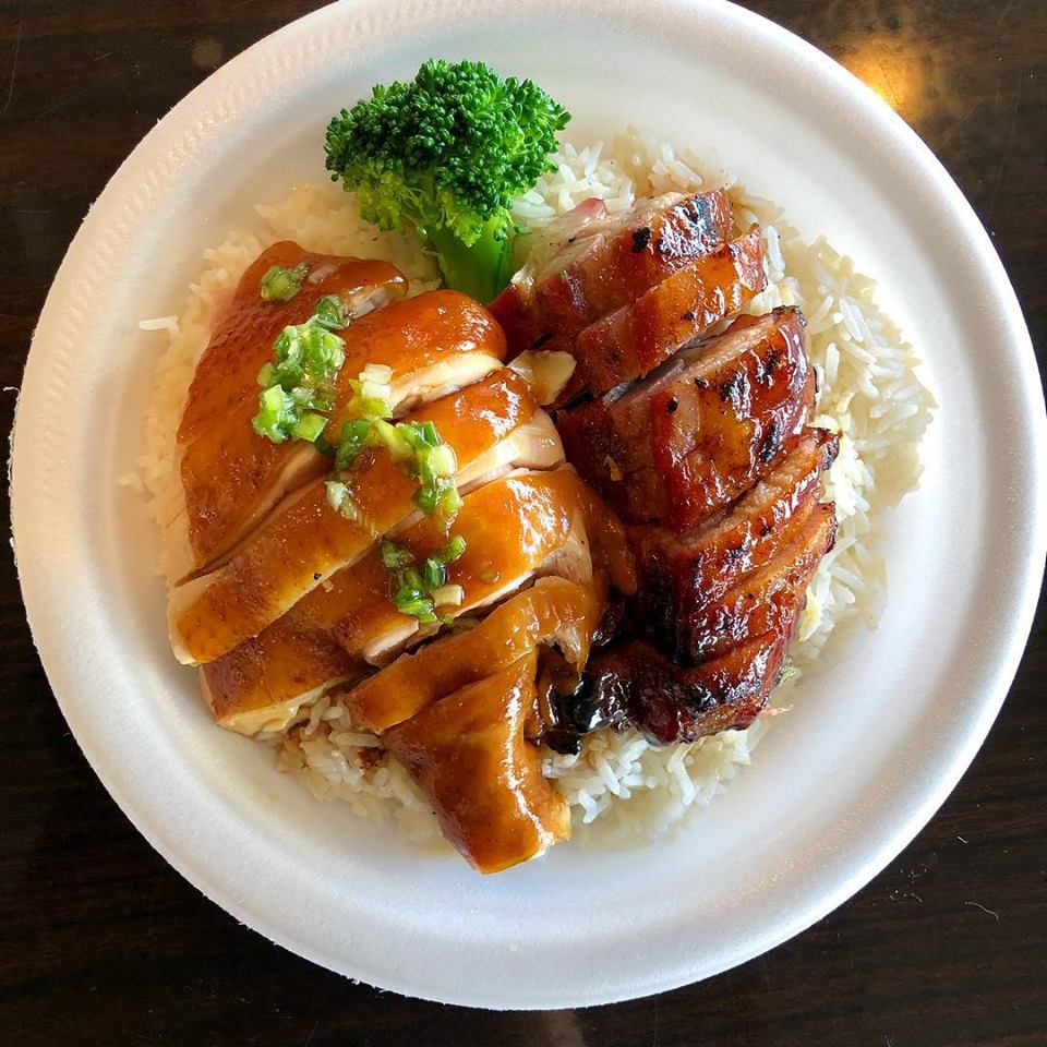 Crispy duck and grilled pork over rice.