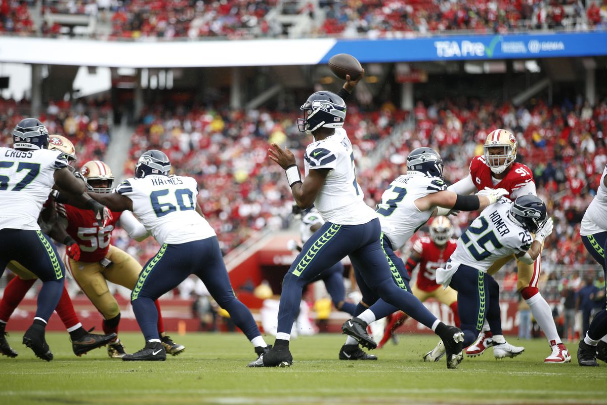 Geno Smith #7 of the Seattle Seahawks passes during the game against the San Francisco 49ers at Levi’s Stadium on September 18, 2022 in Santa Clara, California. The 49ers defeated the Seahawks 27-7.