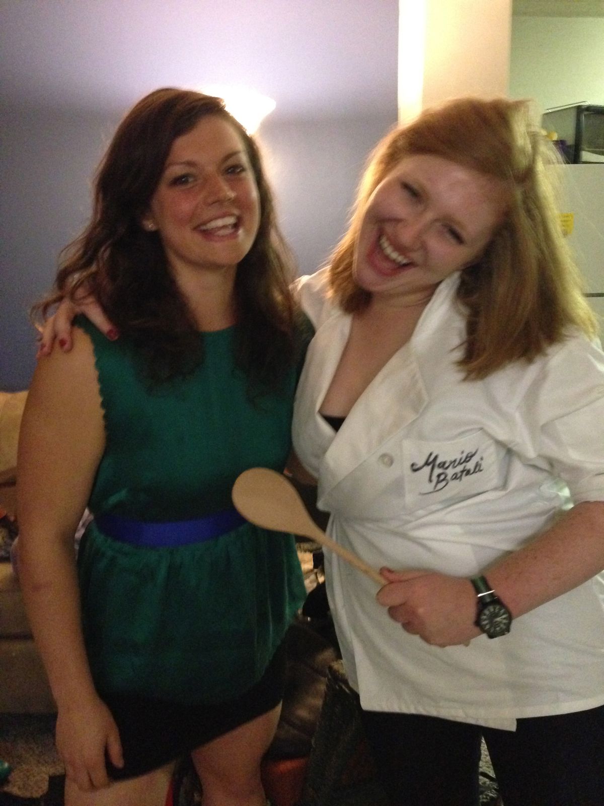 A woman dressed up as Mario Batali with her friend for Halloween.