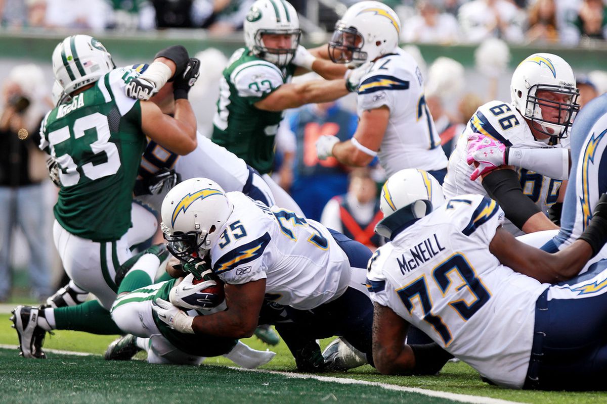 EAST RUTHERFORD, NJ - OCTOBER 23: Mike Tolbert #35 of the San Diego Chargers scores a second quarter touchdown against the New York Jets at MetLife Stadium on October 23, 2011 in East Rutherford, New Jersey.  (Photo by Nick Laham/Getty Images)