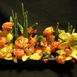 Adore Floral Arrangement (prices range from $55-$215).