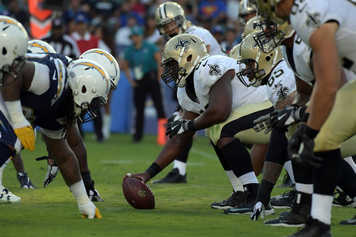 CARSON, CA - New Orleans Saints center Cameron Tom (63) prepares to snap the ball during a preseason exhibition game against the Los Angeles Chargers at the StubHub Center.