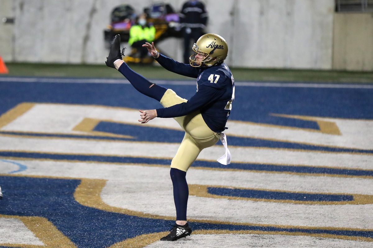 Akron Zips punter Jerry Fitschen punts during the fourth quarter of the college football game between the Western Michigan Broncos and Akron Zips on November 4, 2020, at Summa Field at InfoCision Stadium in Akron, OH.