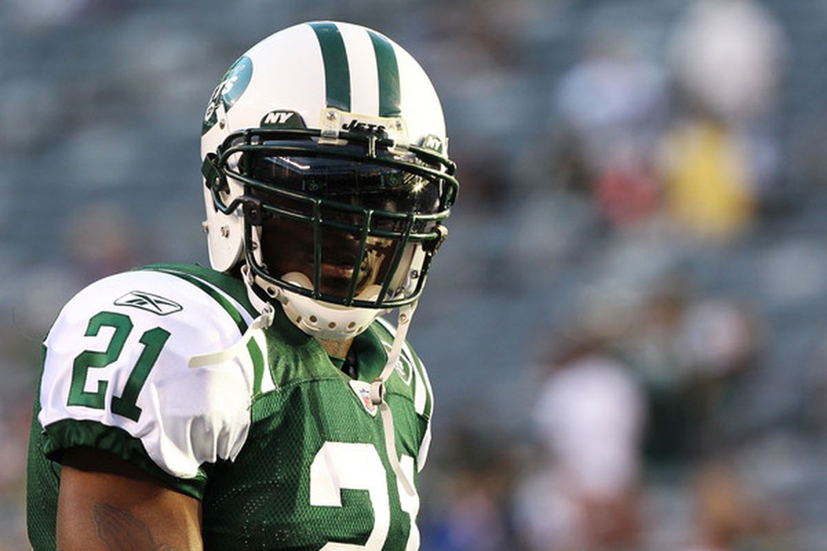 EAST RUTHERFORD NJ - AUGUST 27:  LaDainian Tomlinson #21 of the New York Jets looks on before the game against the Washington Redskins on August 27 2010 at the New Meadowlands Stadium in East Rutherford New Jersey.  (Photo by Al Bello/Getty Images)