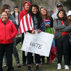Joanna Medina, center, attends the America is Great Rally in Liberty Park in Salt Lake City on Friday, March 18, 2016. 