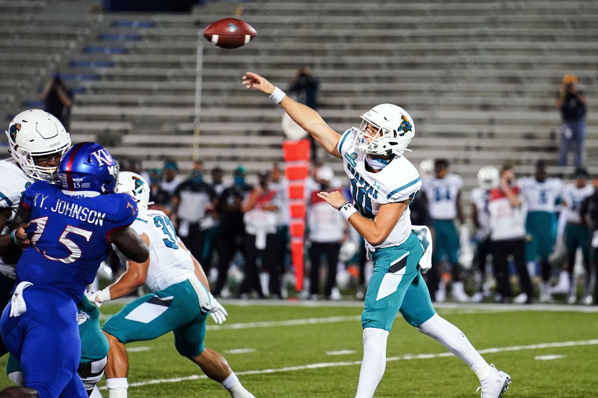 Coastal Carolina Chanticleers quarterback Grayson McCall throws a pass against the Kansas Jayhawks during the second half at David Booth Kansas Memorial Stadium.