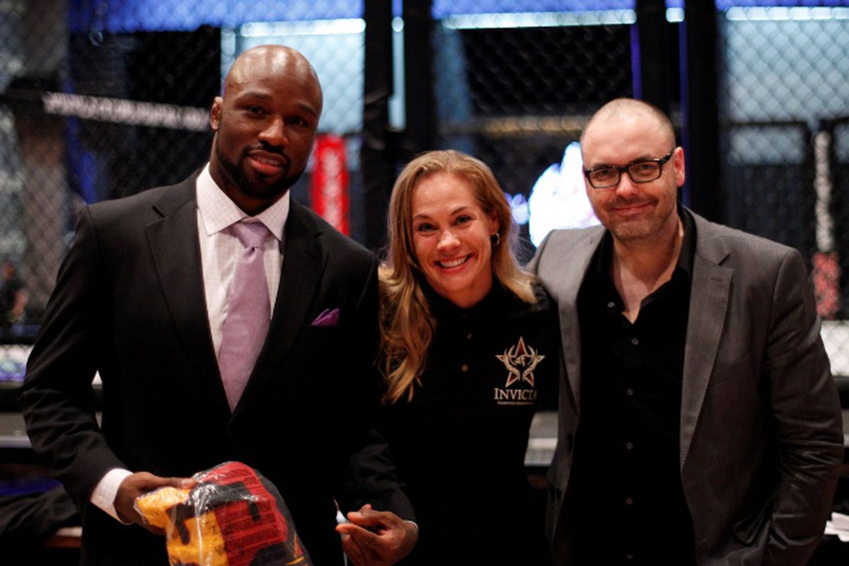 Photo of Julie Kedzie (middle) by Esther Lin for Invicta FC.