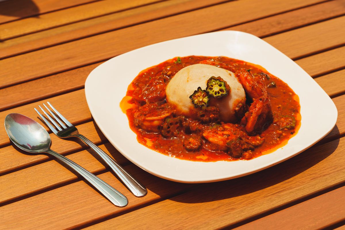 A plate of shrimp and fufu.