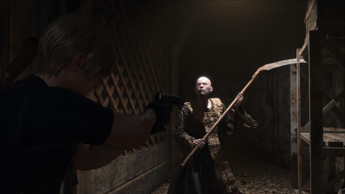 Leon S Kennedy aims at a cultist enemy in the Resident Evil 4 remake, who looks menacingly with a scythe on his hands
